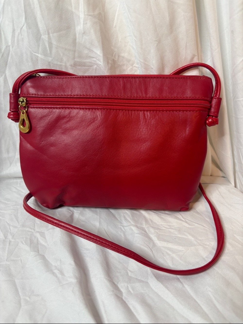 Compact Red Leather Crossbody Bag with Front Zip Pocket